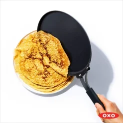 OXO 10" Steel Crepe Pan With Silicone Sleeve Black 5 OXO 10" Steel Crepe Pan With Silicone Sleeve Black -Cookware Specialty Store GUEST 138d374f 7f29 4007 b4a7 cadffe4efe12