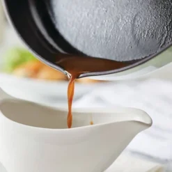 KitchenAid 12" Enameled Cast Iron Induction Skillet With Helper Handle And Pour Spouts Pistachio -Cookware Specialty Store GUEST ef49a22c 3443 4a23 b603 6daeec62b6a7